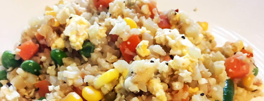 Looking for an easy and healthy alternative to fried rice? Try this Cauliflower Fried Rice that tastes just like takeout and completely trick your taste buds! This low carb recipe is the perfect dish for weeknight meal. 