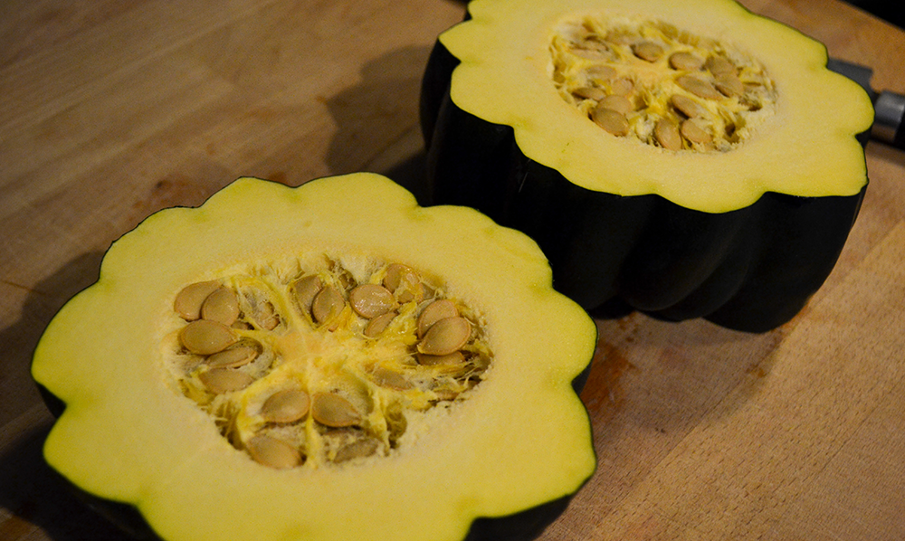 This chicken stuffed acorn squash is perfect for any weeknight or dinner party you have during the autumn season. It's an healthy alternative to potatoes within your meal, making it a low-carb meal that tasty and delicious. The best part is you can easily switch out the protein with turkey leftovers or make it completely vegetarian. This fall inspired dish is great for all!  