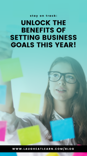 Pin of a woman setting business goals with sticky notes