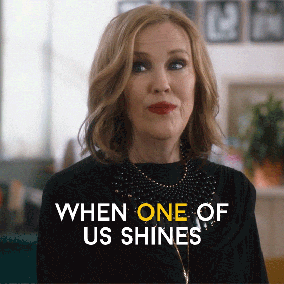 GIF of Moira Rose saying "When one of us shines, all of us shines."